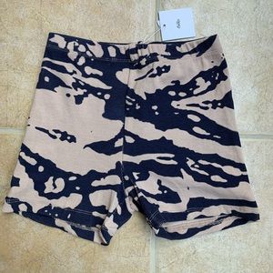 Adika tie dye brown and black biker shorts.